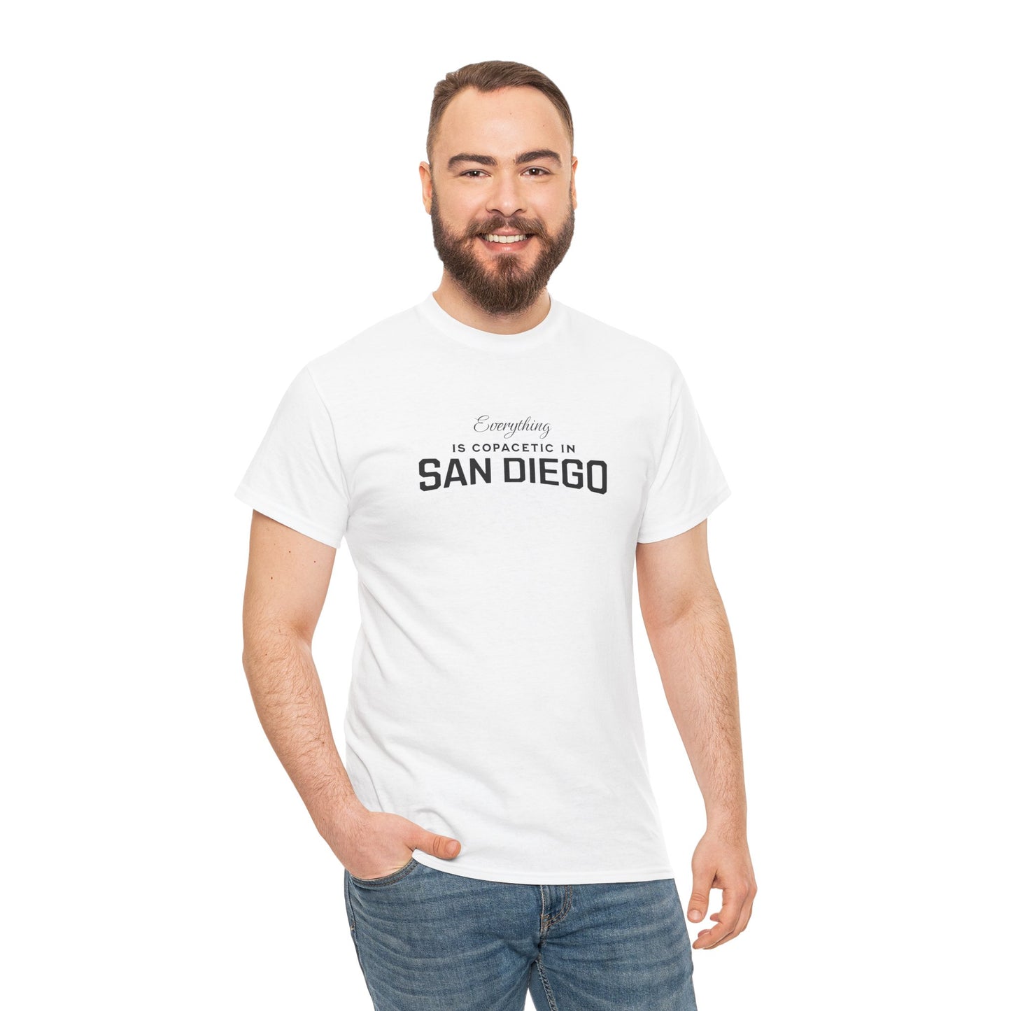Man wearing a white t-shirt with 'Everything is Corrosive in San Diego' text on a white background