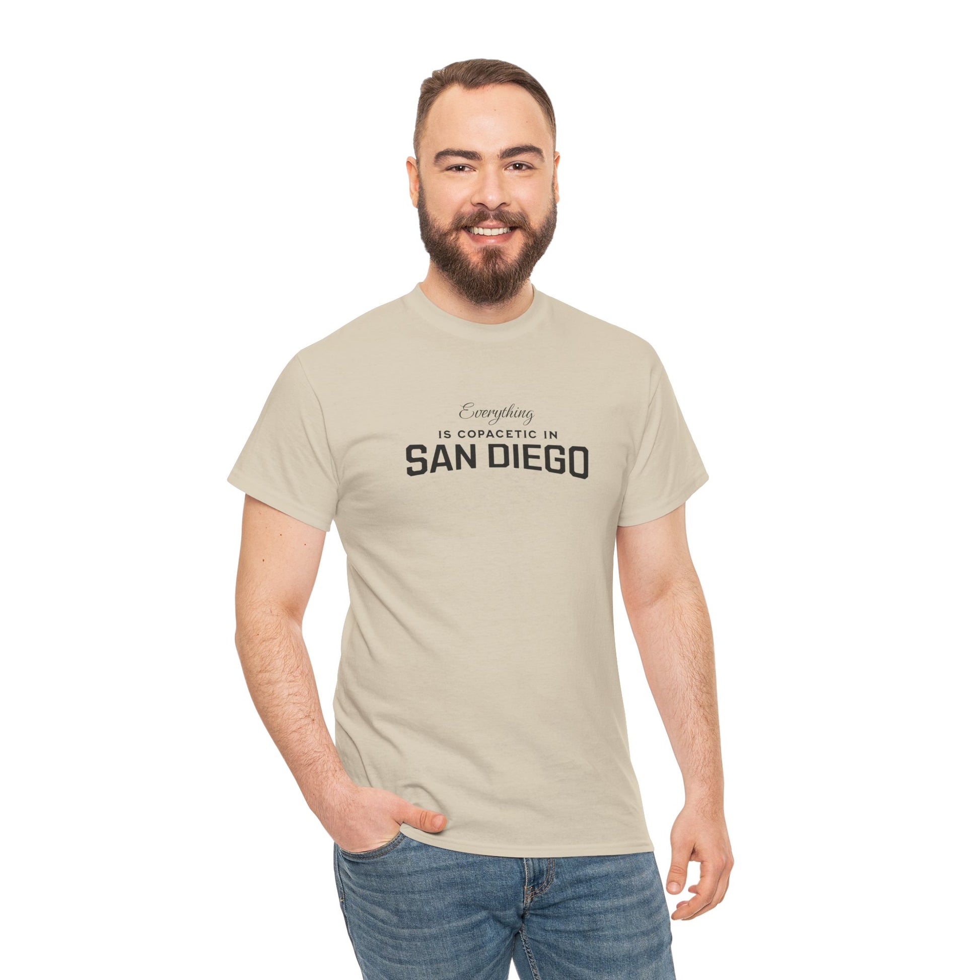 Man wearing a beige t-shirt with 'Everything is fantastic in San Diego' text on a white background